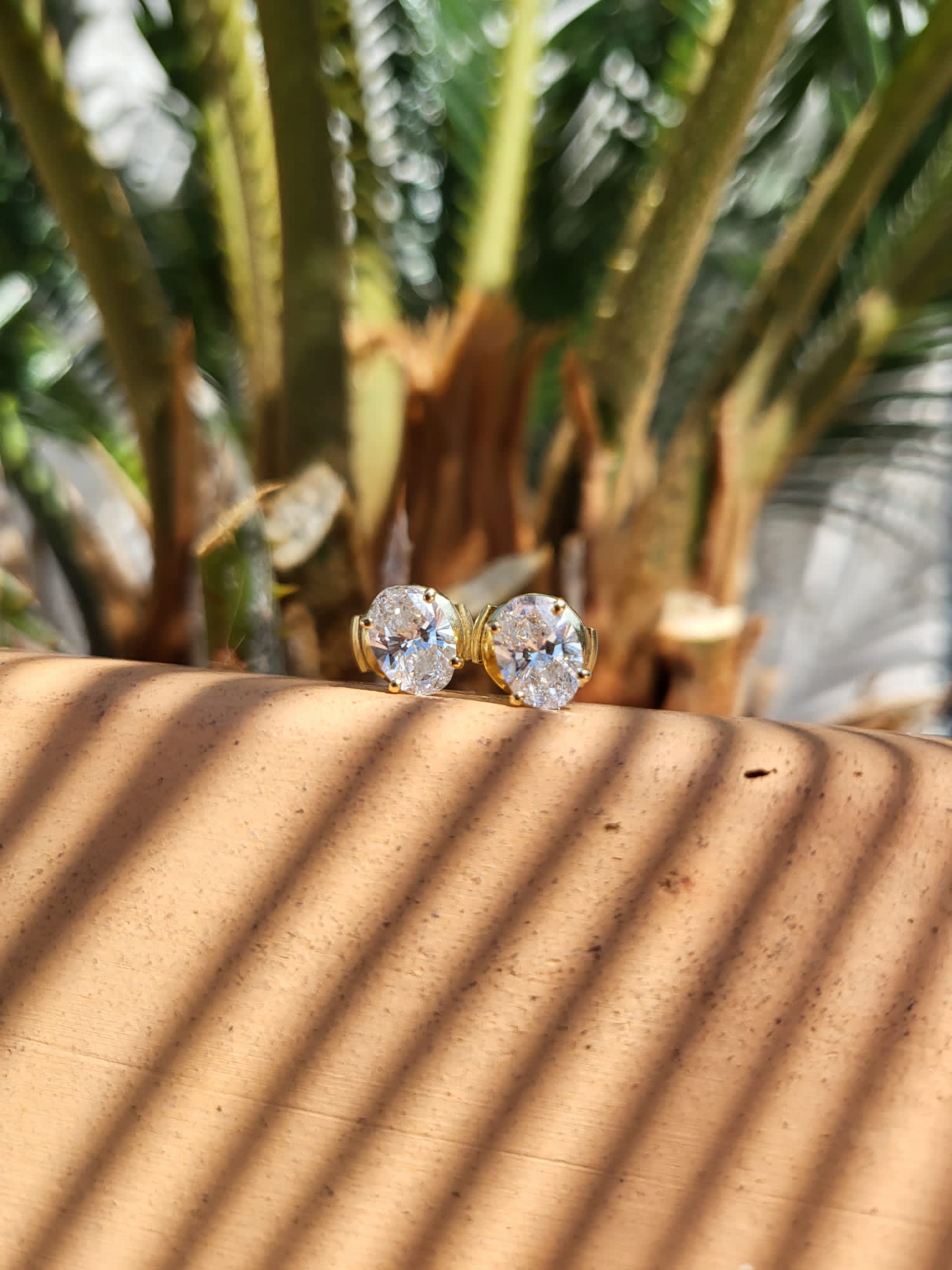 puces d'oreilles diamants en or